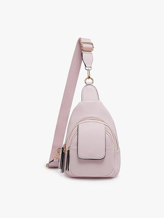 Sling bag made with vegan materials.  Features flap over pocket- stylish & great for hands free shopping!!