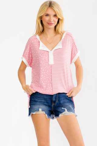Sweet & soft-mixed print henley top.  Features soft pink & white colors.