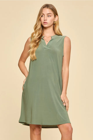 Sleek, Comfy knee length dress...in no wrinkle fabric! Sleeveless with v neck.