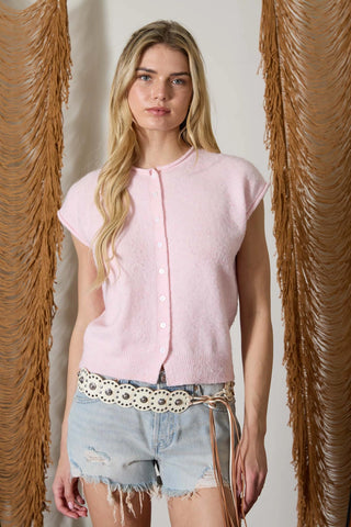 Sleeveless, soft light weight cardigan/vest.  Raw edge trim