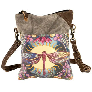 Clea Ray Crossbody bag with dragonfly and floral design.