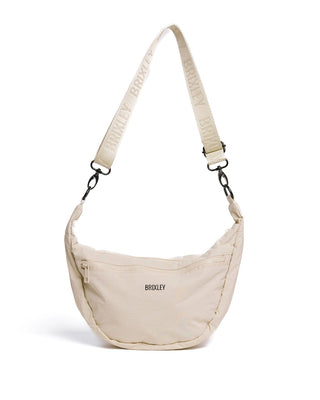 Brixley Cresent Bag in Vanilla Dream.  Multi pockets & detachable strap.