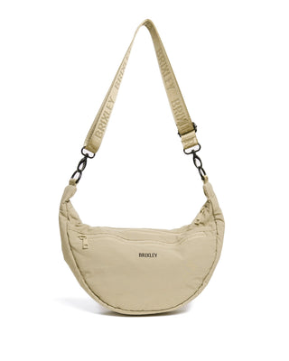 Introducing this stylish Crescent Bag, the perfect blend of functionality and fashion! Designed with the modern individual in mind, this versatile bag features multiple pockets for organized storage, ensuring that all your essentials are easily accessible. With dedicated credit card holders, you can keep your cards secure and within reach, while the smooth zippers provide quick access to your belongings.