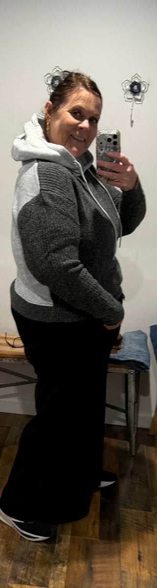 Cute, comfy, and full of texture, this hooded sweater is an instant LOVE IT moment! Ribbed details and a contrasting hood give it that little something extra. Pair it with your favorite denim or leggings for an easy, laid-back look that’s anything but boring.