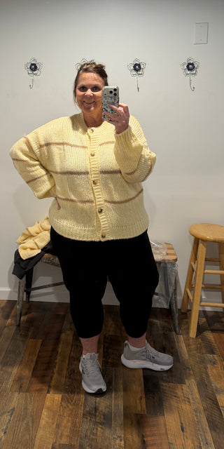 Knit in a lovely stripe jacquard pattern with a classic crew neckline, long sleeves, and a relaxed drop-shoulder fit, it's the cozy piece you'll reach for all season long.