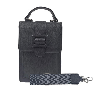 Take a look of this lovely crossbody----large enough to fit all you need but still small and compact. With a 2 inch depth, there is room inside for all the essentials!  Included is the guitar strap, to turn this into a handfree crossbody!