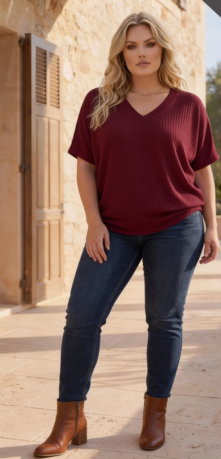 This wonderful, soft rib V-neck is a must for your wardrobe. Embrace relaxed elegance with a flattering V neckline and subtle ruching at the waist for a more defined silhouette. 