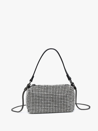 Make a statement with this Rhinestone Satchel/Crossbody. This versatile accessory serves as a satchel, crossbody, or clutch, offering multiple styling options to suit your needs.