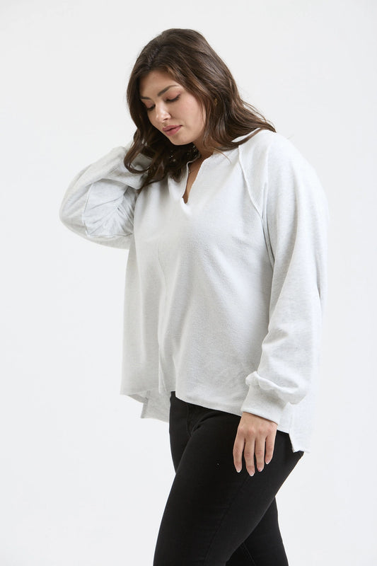 Exposed Seam Relaxed Long Sleeve Knit Top