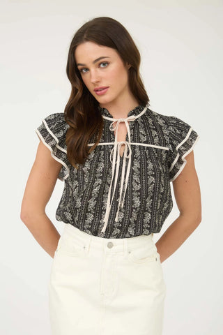 Short ruffle layered sleeve top with double front tie and ruffle trim detail.