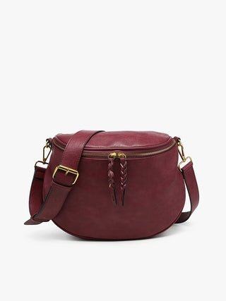 Meet your go-to sling bag for laid-back style with a little edge! A distressed finish gives this bag that perfectly lived-in look, while braided zip pulls and a guitar strap add personality to your everyday outfit. From coffee runs to weekend exploring, The Megan Distressed sling Bag keeps your essentials close without slowing you down.